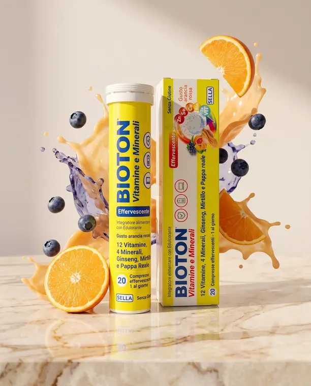 Tubo e confezione di Bioton Vitamine e Minerali effervescente con arance, mirtilli e splash di succo